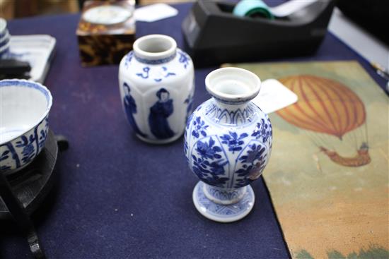 A Chinese blue and white tea bowl and saucer and two jars, Kangxi, some damage, largest diameter 11cm